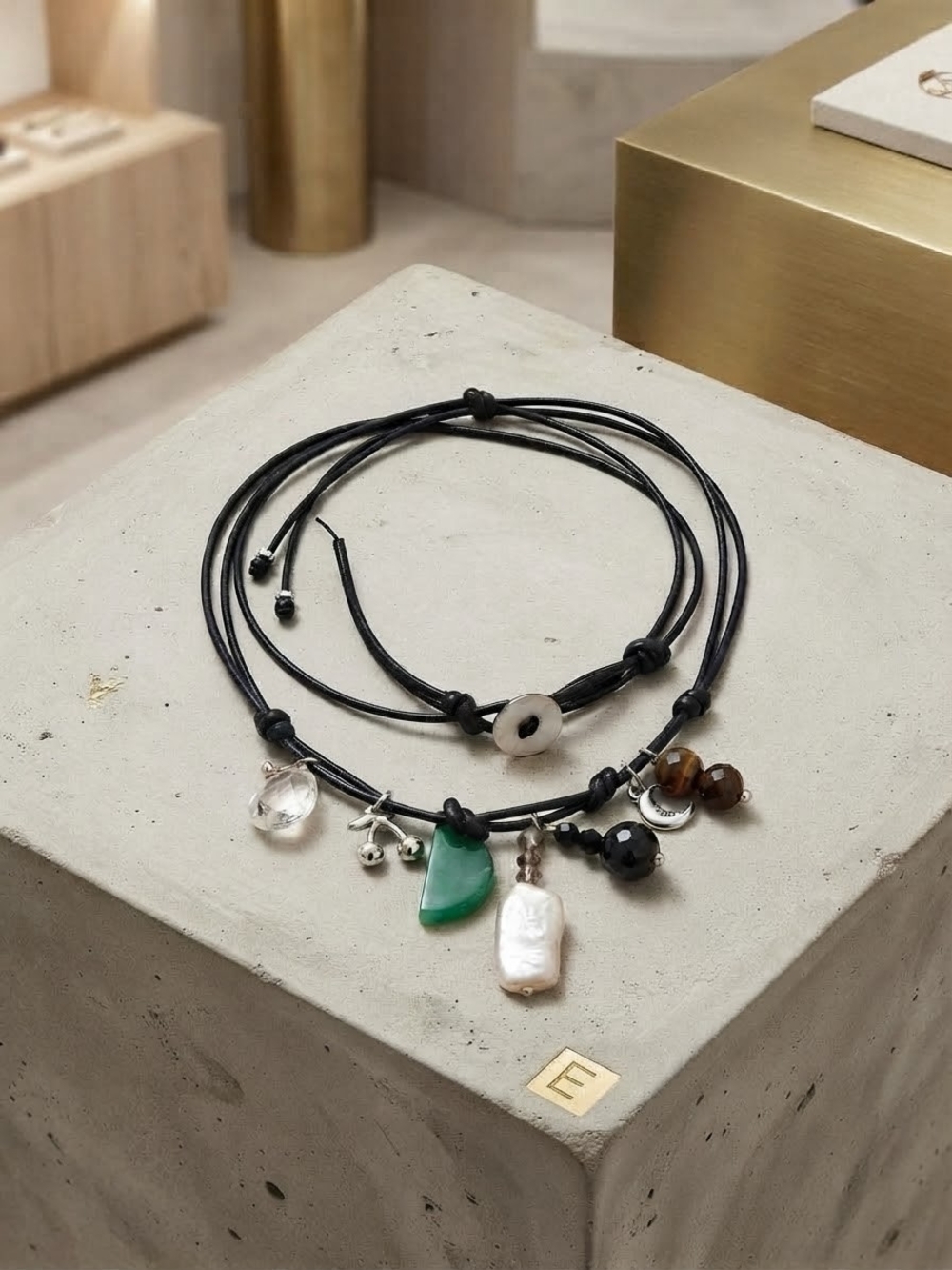 Layered Black Cord Charm Necklace with Green Stone and Pearl
